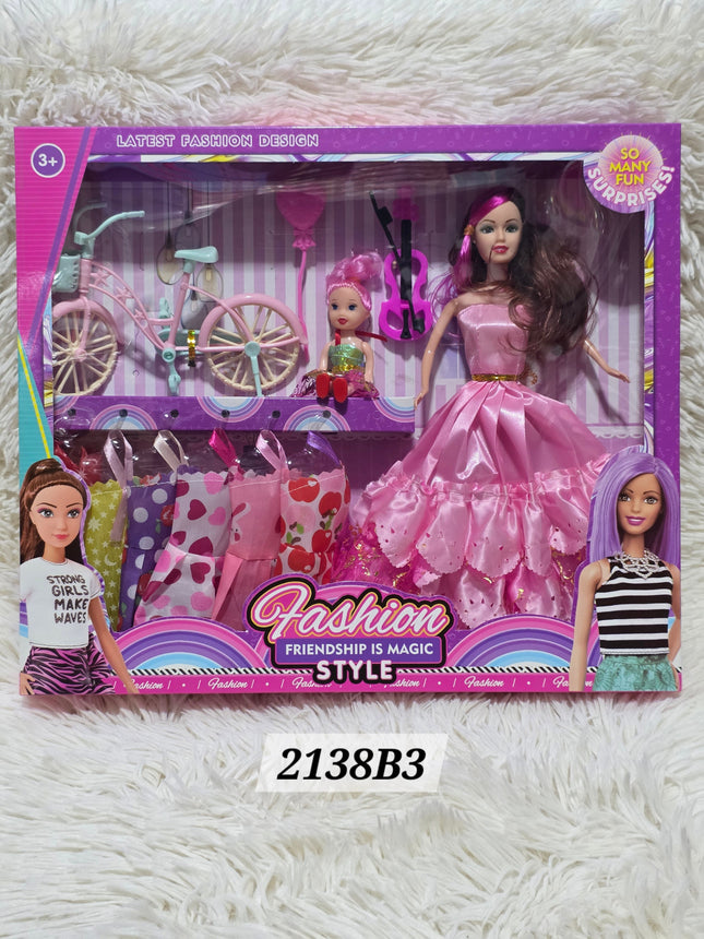 Muñeca con niña y bicicleta